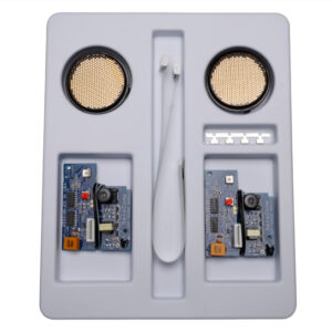 OEM instrument kit with ultrasonic sensors, circuit boards, cables, and mounting parts in plastic tray.