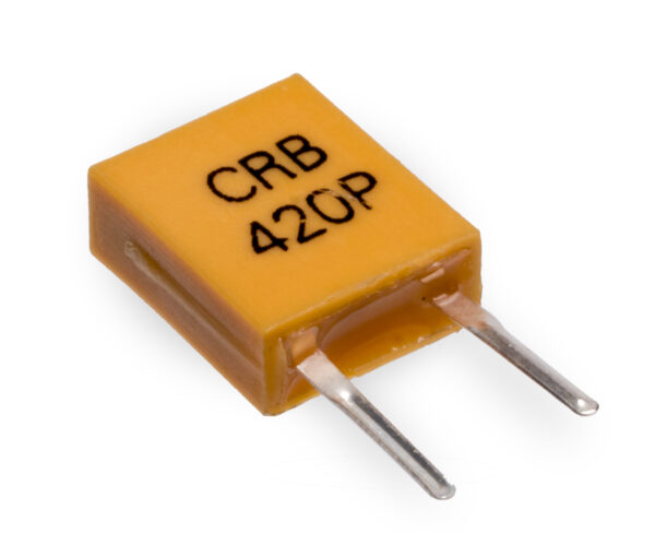 Yellow rectangular capacitor marked CRB 420P with two metal leads extending from the underside, angled on a white background.