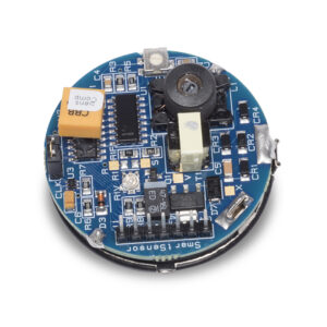 Close-up of round ultrasonic sensor circuit board populated with electronic components, including capacitors, chips, and connectors, shown on a white background.