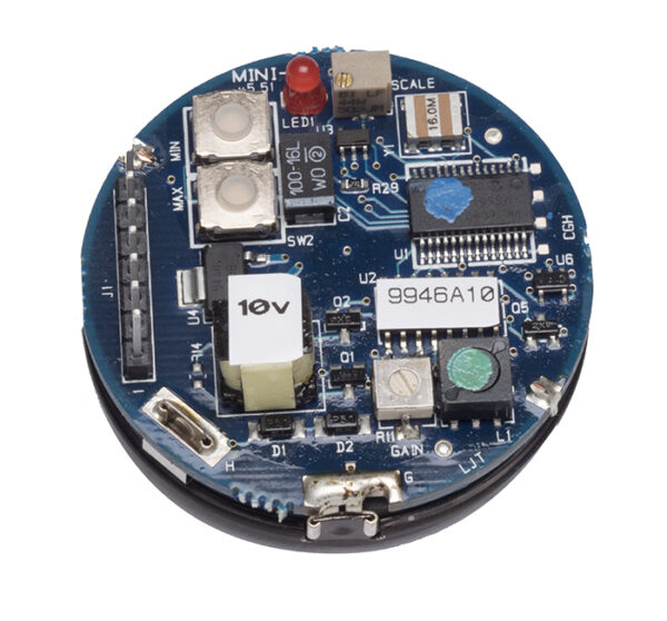 Close-up of circular ultrasonic sensor PCB featuring electronic chips, capacitors, connectors, and labeled stickers, displayed on a white background.