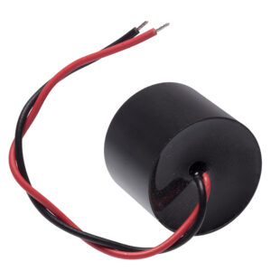 Black cylindrical piezoelectric transducer with red and black wires for electrical connection, isolated on a white background.