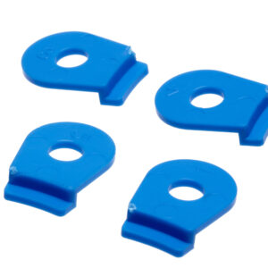 Four blue plastic mounting tabs with center holes and molded edges for securing ultrasonic sensors.