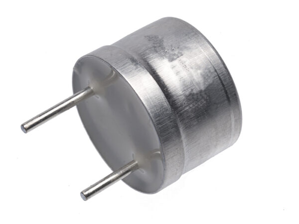 Small silver ultrasonic transducer viewed from the back showing a flat white rear surface and two metal pins extending outward.