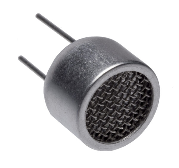 Front view of metal ultrasonic sensor with circular mesh grill and two straight pin leads, shown angled on a white background.
