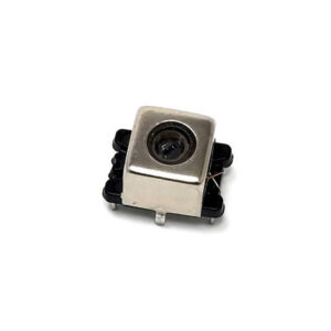 Square metallic electronic inductor with a central circular opening, mounted on a black plastic base with four pins, shown on a white background.