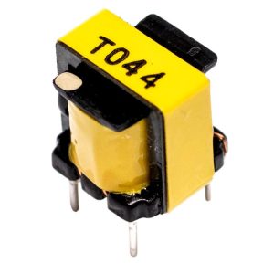 Yellow rectangular electronic transformer labeled T044 with black plastic frame and four metal pins, shown angled on a white background.