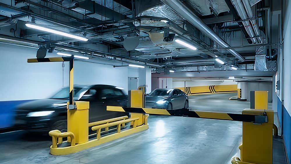 Underground parking barrier arm as a car approaches, a sloped target electrostatic ultrasonic sensors still detect.